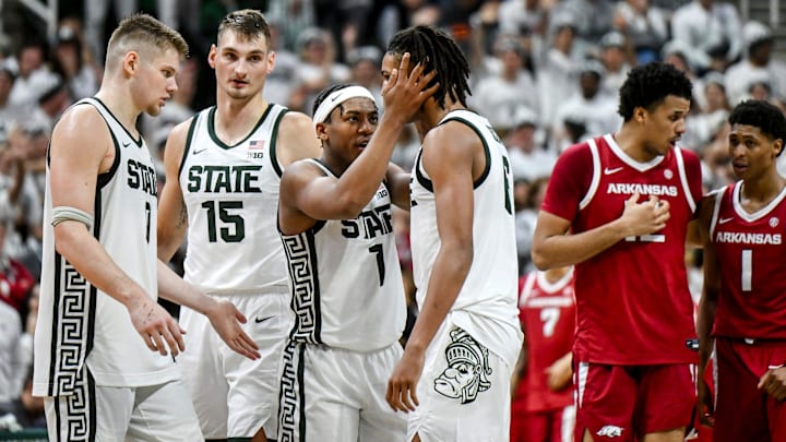 Michigan State's Jeremy Fears Jr., left, talks with Jordan Scott, right, after Scott was fouled by Arkansas during the second half on Saturday, Nov. 8, 2025, at the Breslin Center in East Lansing.