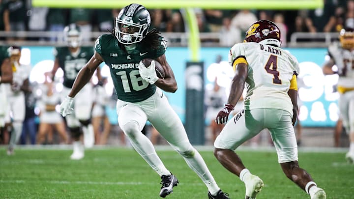 Michigan State wide receiver Christian Fitzpatrick (16) runs against Central Michigan defensive back Donte Kent (4) during the second half at Spartan Stadium in East Lansing on Friday, Sept. 1, 2023. Michigan State wide receiver Christian Fitzpatrick (16) runs against Central Michigan defensive back Donte Kent (4) during the second half at Spartan Stadium in East Lansing on Friday, Sept. 1, 2023.