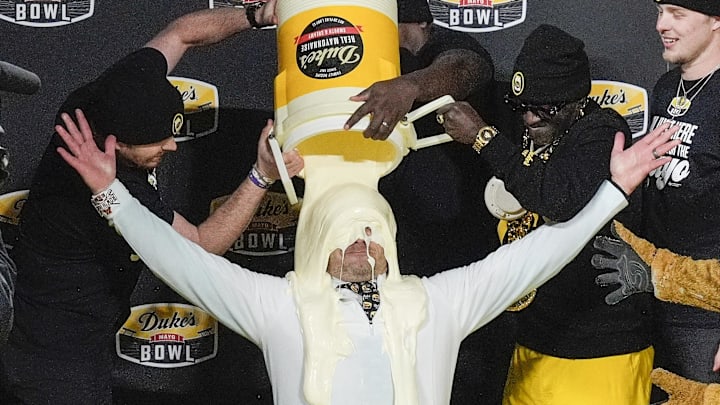 Minnesota Golden Gophers head coach P.J. Fleck reacts to the mayo dump after his teams’ win over Virginia Tech Hokies  at the Duke’s Mayo Bowl at Bank of America Stadium.