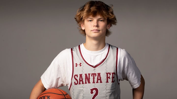 Santa Fe Catholic guard Tate Darner, a Chattanooga commit, will lead the Hawks during his senior year. Santa Fe Catholic guard Tate Darner, a Chattanooga commit, will lead the Hawks during his senior year.