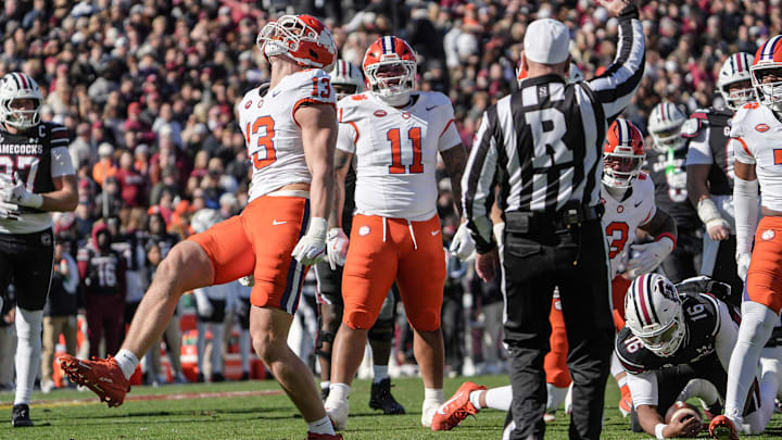 Clemson defensive end Will Heldt (13) reacts after sacking South Carolina quarterback LaNorris Sellers (16) during the first quarter at Williams-Brice Stadium in Columbia, S.C. Saturday, November 29, 2025.