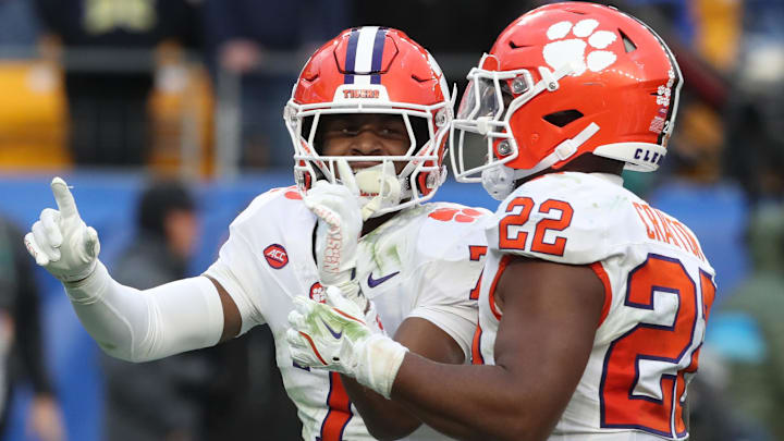 Nov 16, 2024; Pittsburgh, Pennsylvania, USA; Clemson Tigers safety Khalil Barnes (7) celebrates his game clinching interception as time ran out with linebacker Dee Crayton (22) against the Pittsburgh Panthers during the fourth quarter at Acrisure Stadium.