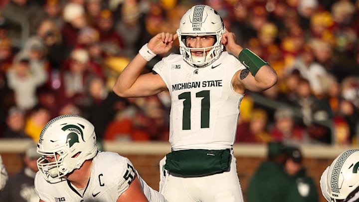 Nov 1, 2025; Minneapolis, Minnesota, USA; Michigan State Spartans quarterback Alessio Milivojevic (11) calls a play against the Minnesota Golden Gophers during the second half at Huntington Bank Stadium. Mandatory Credit: Matt Krohn-Imagn Images