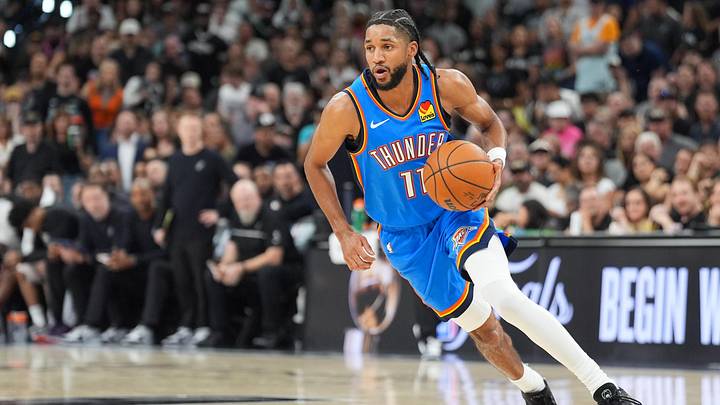 May 24, 2026; San Antonio, Texas, USA; Oklahoma City Thunder guard Isaiah Joe (11) moves the ball in the fourth quarter against the San Antonio Spurs during game four of the western conference finals for the 2026 NBA playoffs at Frost Bank Center. May 24, 2026; San Antonio, Texas, USA; Oklahoma City Thunder guard Isaiah Joe (11) moves the ball in the fourth quarter against the San Antonio Spurs during game four of the western conference finals for the 2026 NBA playoffs at Frost Bank Center.