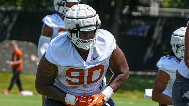 Sydir Mitchell (90) defensive lineman for the Texas Longhorns runs drills at practice at Frank Denius Fields on Thursday, Aug. 1, 2024 in Austin.