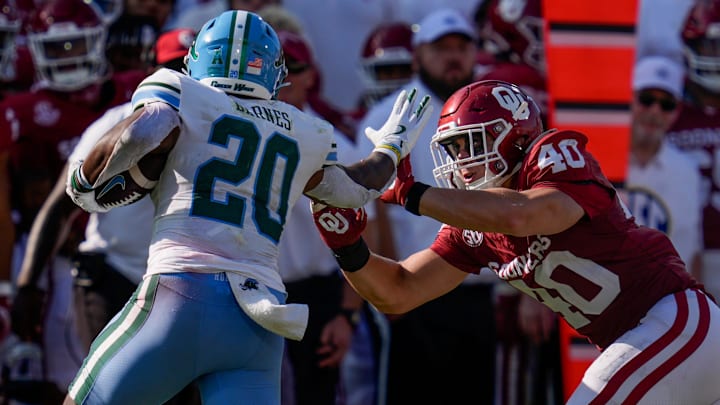 Oklahoma Sooners defensive lineman Ethan Downs (40) chases after Tulane Green Wave running back Arnold Barnes III (20) during a college football game between the University of Oklahoma Sooners (OU) and the Tulane Green Wave at Gaylord Family - Oklahoma Memorial Stadium in Norman, Okla., Saturday, Sept. 14, 2024.