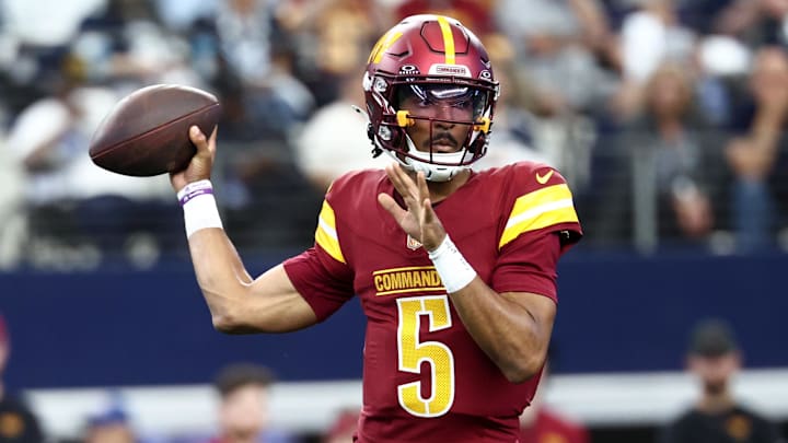 Oct 19, 2025; Arlington, Texas, USA; Washington Commanders quarterback Jayden Daniels (5) passes the ball against the Dallas Cowboys during the first quarter of the game at AT&T Stadium. Mandatory Credit: Kevin Jairaj-Imagn Images Oct 19, 2025; Arlington, Texas, USA; Washington Commanders quarterback Jayden Daniels (5) passes the ball against the Dallas Cowboys during the first quarter of the game at AT&T Stadium. Mandatory Credit: Kevin Jairaj-Imagn Images