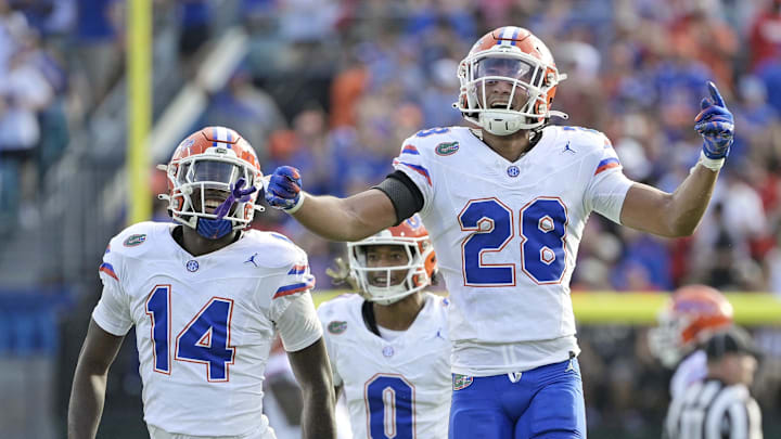 Nov 2, 2024; Jacksonville, Florida, USA; Florida Gators defensive back Devin Moore (28) celebrates after an interception against the Georgia Bulldogs during the first half at EverBank Stadium. Mandatory Credit: Melina Myers-Imagn Images Nov 2, 2024; Jacksonville, Florida, USA; Florida Gators defensive back Devin Moore (28) celebrates after an interception against the Georgia Bulldogs during the first half at EverBank Stadium. Mandatory Credit: Melina Myers-Imagn Images