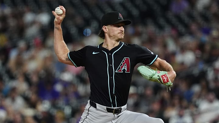 Jun 21, 2025; Denver, Colorado, USA; Arizona Diamondbacks relief pitcher Shelby Miller (18) delivers a pitch in the ninth inning against the Colorado Rockies at Coors Field. Mandatory Credit: Ron Chenoy-Imagn Images