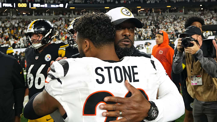 Pittsburgh Steelers head coach Mike Tomlin, Cincinnati Bengals safety Geno Stone