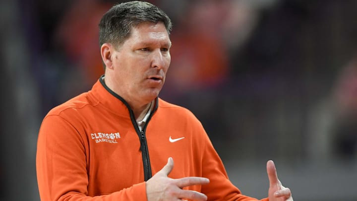 Feb 26, 2025; Clemson, South Carolina, USA; Clemson Head Coach Brad Brownell reacts with the team in the game against Notre Dame during the second half at Littlejohn Coliseum. Mandatory Credit: Ken Ruinard-Imagn Images