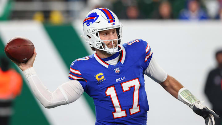 Oct 14, 2024; East Rutherford, New Jersey, USA; Buffalo Bills quarterback Josh Allen (17) throws a pass against the New York Jets during the second half at MetLife Stadium.