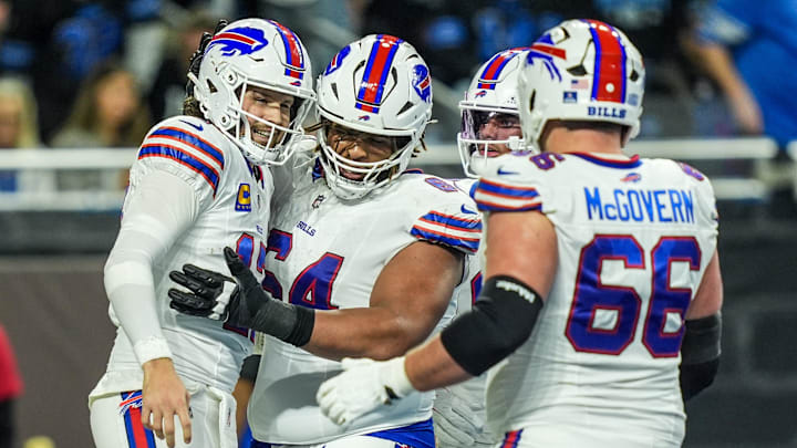 Buffalo Bills quarterback Josh Allen (17), offensive linemen O’Cyrus Torrence (64) Connor McGovern (66), and Keon Coleman (0).