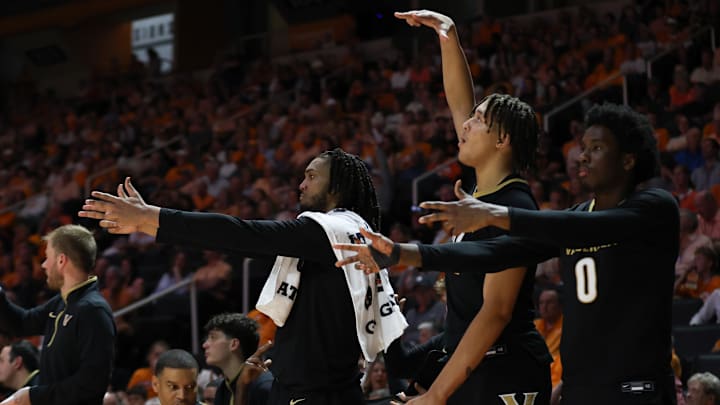 Mar 7, 2026; Knoxville, Tennessee, USA;  The Vanderbilt Commodores bench reacts to a play against the Tennessee Volunteers during the second half at Thompson-Boling Arena at Food City Center. Mandatory Credit: Randy Sartin-Imagn Images