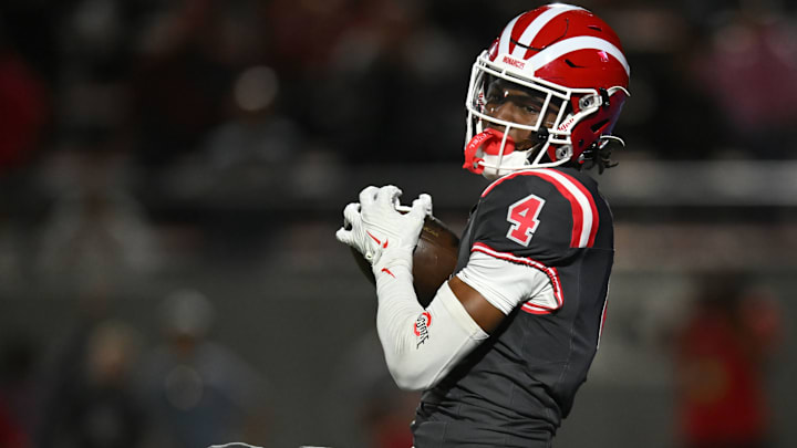 Kayden Dixon-Wyatt scored Mater Dei's first of eight touchdowns in a 59-14 route of St. John Bosco at Santa Ana Stadium on Friday, October 25, 2024. Kayden Dixon-Wyatt scored Mater Dei's first of eight touchdowns in a 59-14 route of St. John Bosco at Santa Ana Stadium on Friday, October 25, 2024.