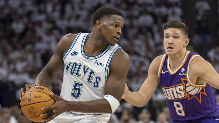 Apr 20, 2024; Minneapolis, Minnesota, USA; Minnesota Timberwolves guard Anthony Edwards (5) holds