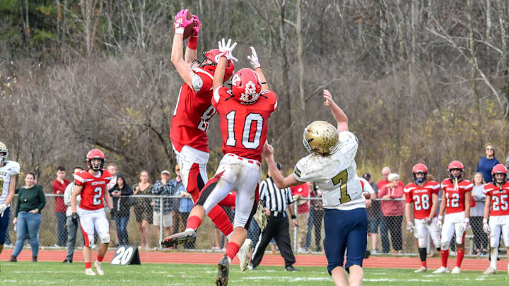 CVU's Alex Provost jumps for the interception during the Redhawks' D1 football semifinal vs the Essex Hornets on Saturday afternoon in Hinesburg

D1 Football Semifinal Essex At Cvu 05nov22 9025