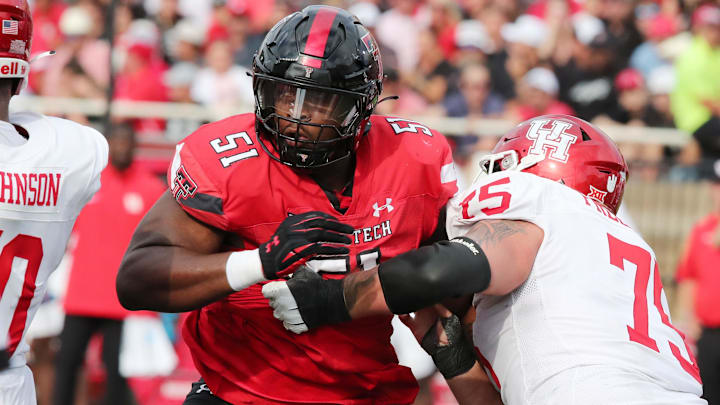 Sep 30, 2023; Lubbock, Texas, USA;  Texas Tech Red Raiders defensive linebacker Jayden Cofield (51) rushes against Houston Cougars offensive center Jack Freeman (75) in the second half at Jones AT&T Stadium and Cody Campbell Field. Mandatory Credit: Michael C. Johnson-USA TODAY Sports