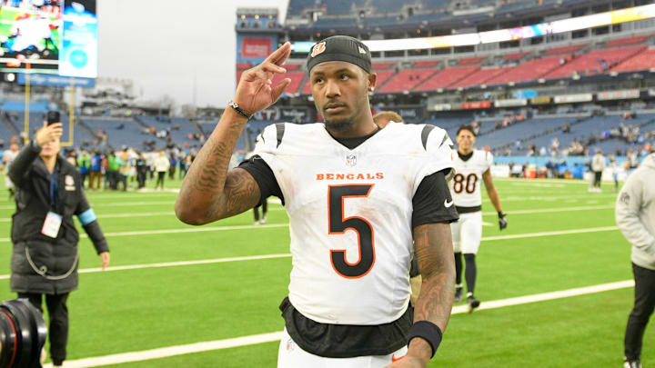 Cincinnati Bengals wide receiver Tee Higgins (5) salutes the Cincinnati Bengals fans that traveled against the Tennessee Titans post game  at Nissan Stadium.