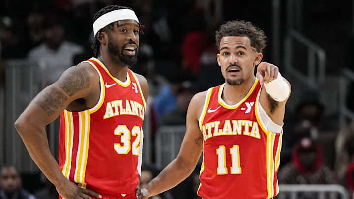 Atlanta Hawks guard Trae Young (11) and Wesley Matthews (32)