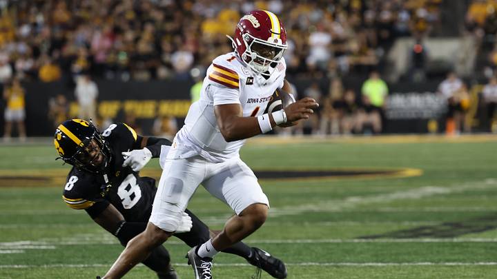 Sep 12, 2026; Iowa City, Iowa, USA; Iowa State Cyclones quarterback Jaylen Raynor (1) carries the ball as Iowa Hawkeyes defensive back Deshaun Lee (8) defends during the second quarter at Kinnick Stadium. Mandatory Credit: Reese Strickland-Imagn Images Sep 12, 2026; Iowa City, Iowa, USA; Iowa State Cyclones quarterback Jaylen Raynor (1) carries the ball as Iowa Hawkeyes defensive back Deshaun Lee (8) defends during the second quarter at Kinnick Stadium. Mandatory Credit: Reese Strickland-Imagn Images