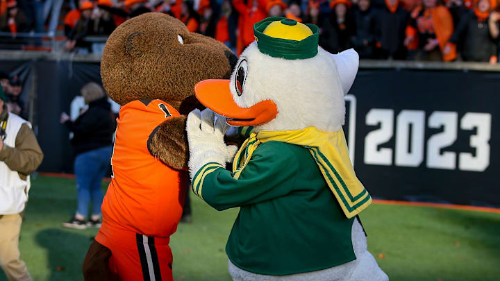 The Oregon Duck and Benny the Beaver have a pillowfight on the turf as the No. 9 Oregon Ducks take on the No. 21 Oregon State Beavers at Reser Stadium in Corvallis, Ore. Saturday, Nov. 26, 2022.

Ncaa Football Uo Vs Osu Rivalry Game University Of Oregon At Oregon State