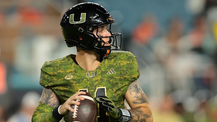 Oct 25, 2025; Miami Gardens, Florida, USA; Miami Hurricanes quarterback Carson Beck (11) looks for a passing option against Stanford Cardinal during the second quarter at Hard Rock Stadium. Mandatory Credit: Sam Navarro-Imagn Images Oct 25, 2025; Miami Gardens, Florida, USA; Miami Hurricanes quarterback Carson Beck (11) looks for a passing option against Stanford Cardinal during the second quarter at Hard Rock Stadium. Mandatory Credit: Sam Navarro-Imagn Images