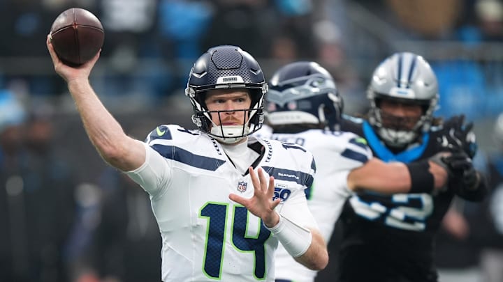Dec 28, 2025; Charlotte, North Carolina, USA; Seattle Seahawks quarterback Sam Darnold (14) throws a pass against the Carolina Panthers during the fourth quarter at Bank of America Stadium. Mandatory Credit: Jim Dedmon-Imagn Images Dec 28, 2025; Charlotte, North Carolina, USA; Seattle Seahawks quarterback Sam Darnold (14) throws a pass against the Carolina Panthers during the fourth quarter at Bank of America Stadium. Mandatory Credit: Jim Dedmon-Imagn Images