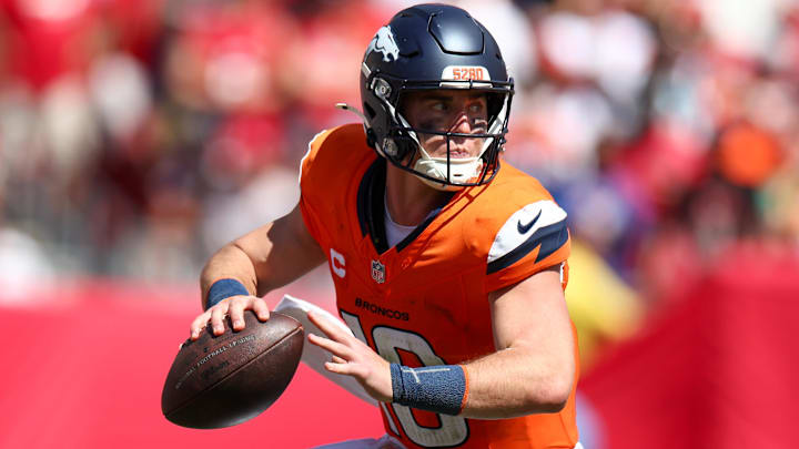 Sep 22, 2024; Tampa, Florida, USA; Denver Broncos quarterback Bo Nix (10) drops back to pass against the Tampa Bay Buccaneers in the third quarter at Raymond James Stadium. 