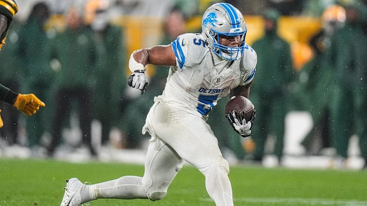 Detroit Lions running back David Montgomery (5) runs against Green Bay Packers during the second half at Lambeau Field in Green Bay, Wis. on Sunday, Nov. 3, 2024. Detroit Lions running back David Montgomery (5) runs against Green Bay Packers during the second half at Lambeau Field in Green Bay, Wis. on Sunday, Nov. 3, 2024.
