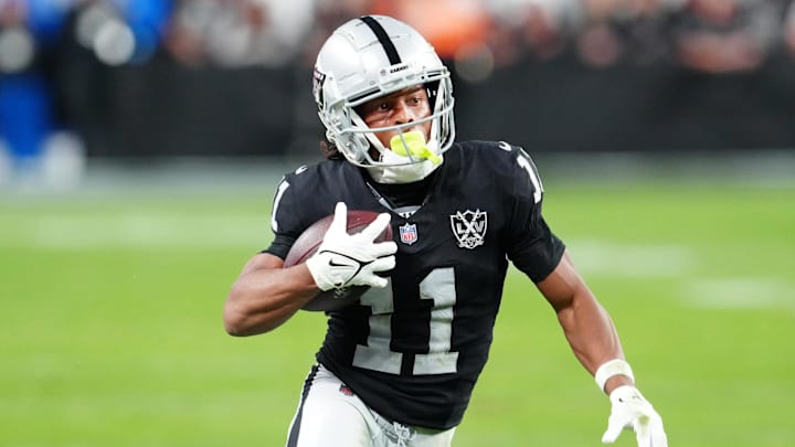 Nov 24, 2024; Paradise, Nevada, USA; Las Vegas Raiders wide receiver Tre Tucker (11) gains yardage against the Denver Broncos during the fourth quarter at Allegiant Stadium. Mandatory Credit: Stephen R. Sylvanie-Imagn Images
