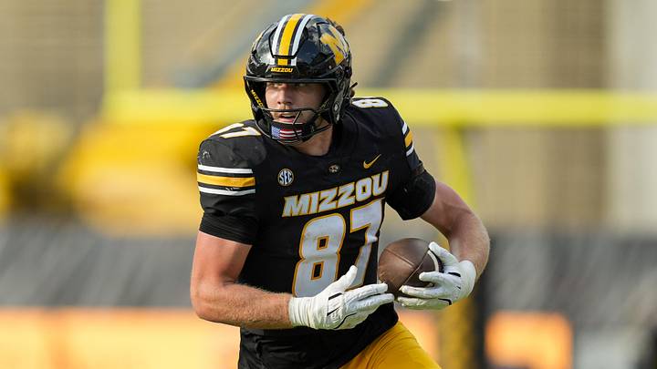 Missouri Tigers tight end Brett Norfleet (87) runs with the ball during the second half against the Kansas Jayhawks at Faurot Field at Memorial Stadium. Missouri Tigers tight end Brett Norfleet (87) runs with the ball during the second half against the Kansas Jayhawks at Faurot Field at Memorial Stadium.