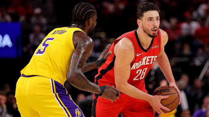 May 1, 2026; Houston, Texas, USA; Houston Rockets center Alperen Sengun (28) handles the ball against Los Angeles Lakers center Deandre Ayton (5) during the first quarter game six of the first round of the 2026 NBA Playoffs at Toyota Center. Mandatory Credit: Erik Williams-Imagn Images May 1, 2026; Houston, Texas, USA; Houston Rockets center Alperen Sengun (28) handles the ball against Los Angeles Lakers center Deandre Ayton (5) during the first quarter game six of the first round of the 2026 NBA Playoffs at Toyota Center. Mandatory Credit: Erik Williams-Imagn Images