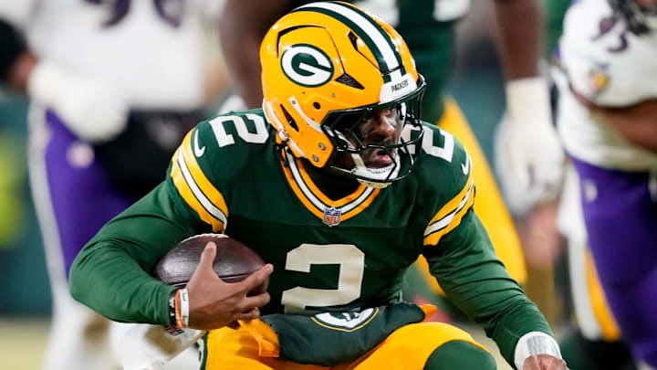 Dec 27, 2025; Green Bay, Wisconsin, USA; Green Bay Packers quarterback Malik Willis (2) runs the ball during the third quarter against the Baltimore Ravens at Lambeau Field. Mandatory Credit: Kayla Wolf-Imagn Images