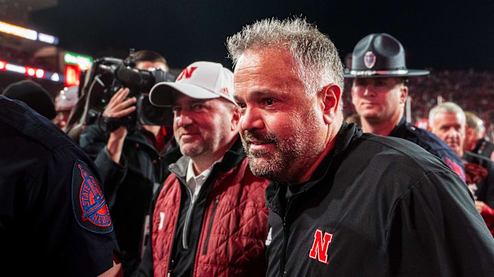 Nov 23, 2024; Lincoln, Nebraska, USA; Nebraska Cornhuskers head coach Matt Rhule and athletic director Troy Dannen walk off the field after defeating the Wisconsin Badgers at Memorial Stadium.