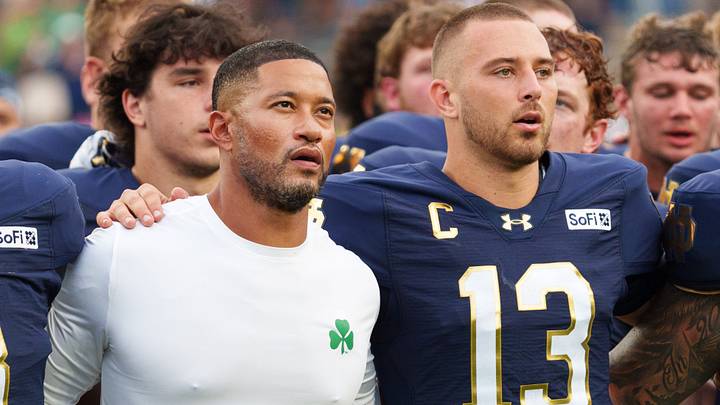 Notre Dame head coach Marcus Freeman, left, and quarterback CJ Carr (13) celebrate after winning a NCAA football game 52-0 against Rice at Notre Dame Stadium on Saturday, Sept. 12, 2026, in South Bend. Notre Dame head coach Marcus Freeman, left, and quarterback CJ Carr (13) celebrate after winning a NCAA football game 52-0 against Rice at Notre Dame Stadium on Saturday, Sept. 12, 2026, in South Bend.