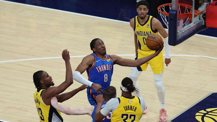 Jun 13, 2025; Indianapolis, Indiana, USA; Oklahoma City Thunder forward Jalen Williams (8) drives to the hoop past Indiana Pacers forward Aaron Nesmith (23) during the fourth quarter in Game 4 of the 2025 NBA Finals at Gainbridge Fieldhouse. Mandatory Credit: Trevor Ruszkowski-Imagn Images