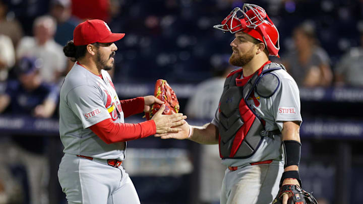 Aug 21, 2025; Tampa, Florida, USA; St. Louis Cardinals pitcher JoJo Romero (59) and catcher Pedro Pages (43) react after beating the Tampa Bay Rays at George M. Steinbrenner Field. Mandatory Credit: Nathan Ray Seebeck-Imagn Images
