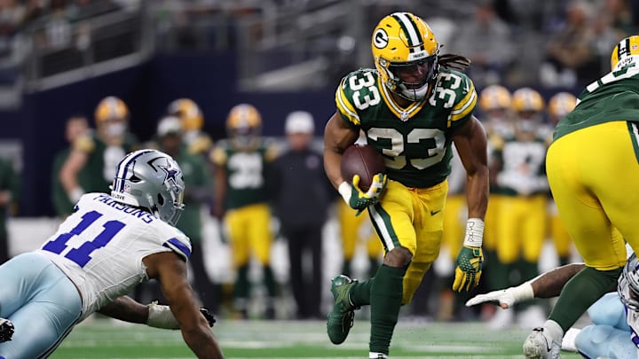 Jan 14, 2024; Arlington, Texas, USA; Green Bay Packers running back Aaron Jones (33) rushes the ball