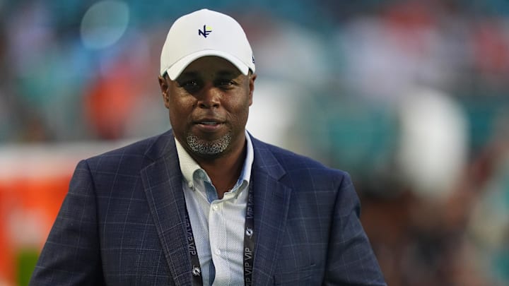 Sep 30, 2024; Miami Gardens, Florida, USA; Miami Dolphins general manager Chris Grier walks not the field prior to the game between the Miami Dolphins and the Tennessee Titans at Hard Rock Stadium. Mandatory Credit: Jasen Vinlove-Imagn Images