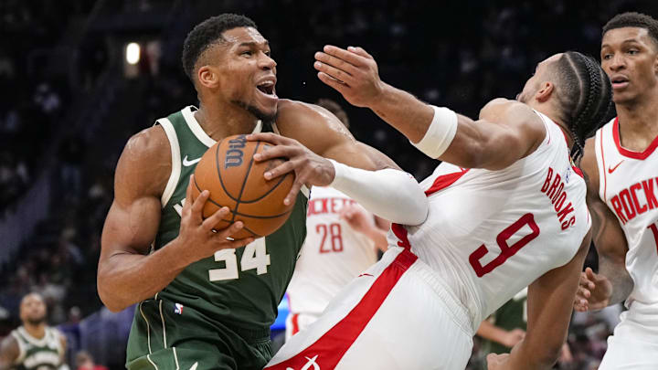 Nov 18, 2024; Milwaukee, Wisconsin, USA; Milwaukee Bucks forward Giannis Antetokounmpo (34) drives for the basket against Houston Rockets forward Dillon Brooks (9) during the third quarter at Fiserv Forum. Mandatory Credit: Jeff Hanisch-Imagn Images Nov 18, 2024; Milwaukee, Wisconsin, USA; Milwaukee Bucks forward Giannis Antetokounmpo (34) drives for the basket against Houston Rockets forward Dillon Brooks (9) during the third quarter at Fiserv Forum. Mandatory Credit: Jeff Hanisch-Imagn Images