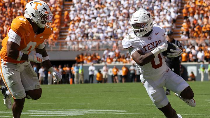 Sep 26, 2026; Knoxville, Tennessee, USA;  Texas Longhorns running back Raleek Brown runs against Tennessee Volunteers linebacker Amare Campbell during the second half at Neyland Stadium.   Randy Sartin-Imagn Images