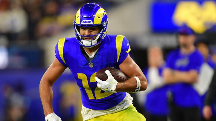  Los Angeles Rams wide receiver Puka Nacua (12) runs after making a catch during the second quarter against the Buffalo Bills at SoFi Stadium.  Mandatory Credit: Gary A. Vasquez-Imagn Images