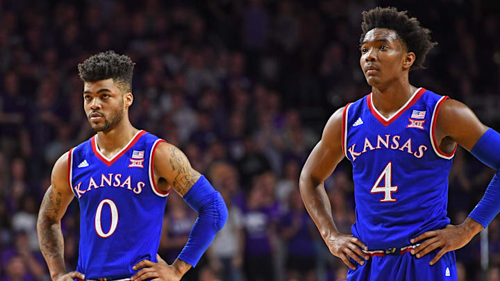 Kansas basketball stars Frank Mason (0) and Devonte' Graham (4)