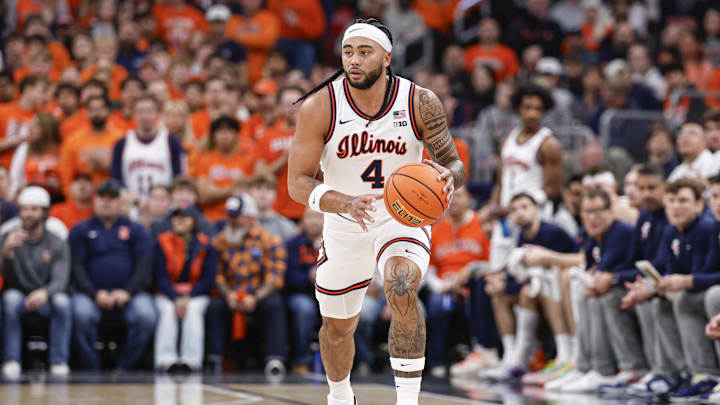 Nov 19, 2025; Chicago, Illinois, USA; Illinois Fighting Illini guard Kylan Boswell (4) brings the ball up court against the Alabama Crimson Tide during the first half at United Center. Mandatory Credit: Kamil Krzaczynski-Imagn Images