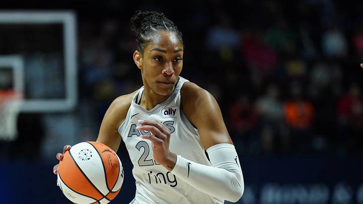May 20, 2025; Uncasville, Connecticut, USA; Las Vegas Aces center A'ja Wilson (22) returns the ball against the Connecticut Sun in the first half at Mohegan Sun Arena. Mandatory Credit: David Butler II-Imagn Images May 20, 2025; Uncasville, Connecticut, USA; Las Vegas Aces center A'ja Wilson (22) returns the ball against the Connecticut Sun in the first half at Mohegan Sun Arena. Mandatory Credit: David Butler II-Imagn Images