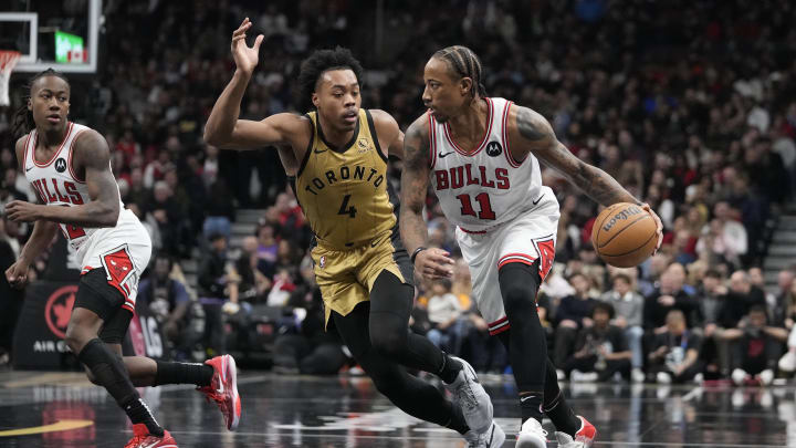 Nov 24, 2023; Toronto, Ontario, CAN; Chicago Bulls forward DeMar DeRozan (11) drives to the basket against Toronto Raptors forward Scottie Barnes (4) during the first half at Scotiabank Arena. Mandatory Credit: John E. Sokolowski-USA TODAY Sports Nov 24, 2023; Toronto, Ontario, CAN; Chicago Bulls forward DeMar DeRozan (11) drives to the basket against Toronto Raptors forward Scottie Barnes (4) during the first half at Scotiabank Arena. Mandatory Credit: John E. Sokolowski-USA TODAY Sports