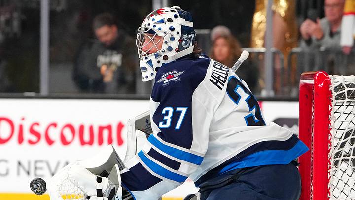 Apr 13, 2026; Las Vegas, Nevada, USA; Winnipeg Jets goaltender Connor Hellebuyck (37) warms up before the start of a game against the Vegas Golden Knights at T-Mobile Arena. Mandatory Credit: Stephen R. Sylvanie-Imagn Images