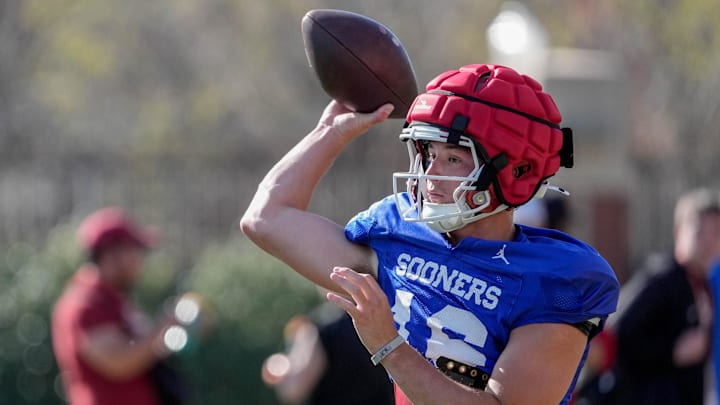 Cole Gonzales runs drills during an Oklahoma football practice. Cole Gonzales runs drills during an Oklahoma football practice.