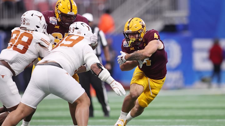 Cam Skattebo and Arizona State are playing former Big 12 member Texas in the Chick-fil-A Peach Bowl. Cam Skattebo and Arizona State are playing former Big 12 member Texas in the Chick-fil-A Peach Bowl.